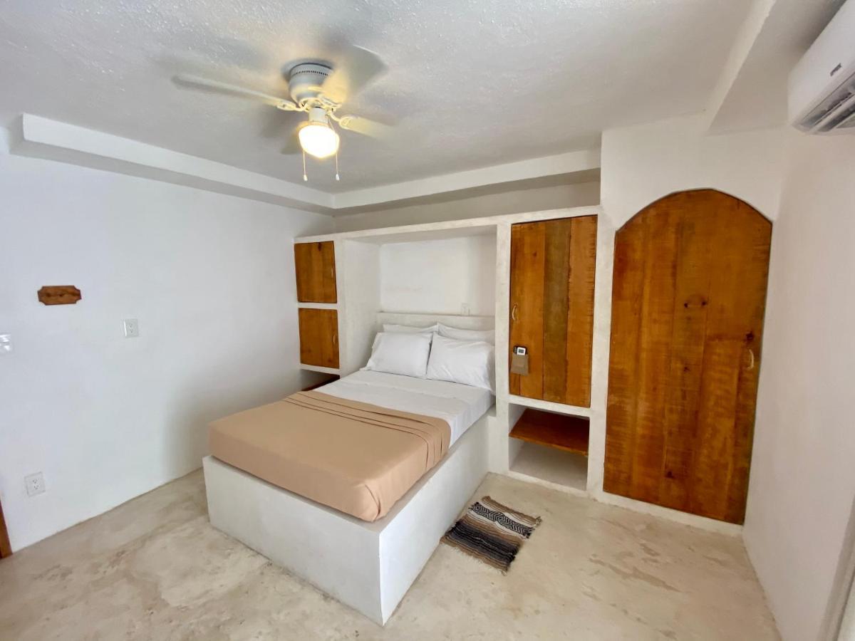 Mio Cancun Hotel Boutique Dış mekan fotoğraf A bedroom in the hotel